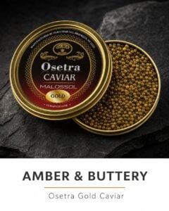 Tin of Osetra Gold Caviar (Malossol) with open lid showing gold-capped pearls on a dark surface; label reads Amber & Buttery Osetra Gold Caviar, brand OLMA.