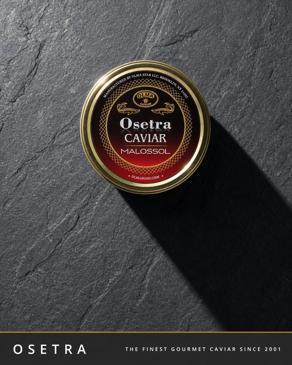 Tin of Osetra caviar on a dark slate surface with a long shadow; label says Osetra Caviar Malossol.